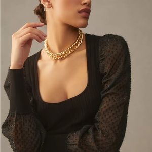 Anthropologie Black Ribbed Top with Sheer Puff Sleeves